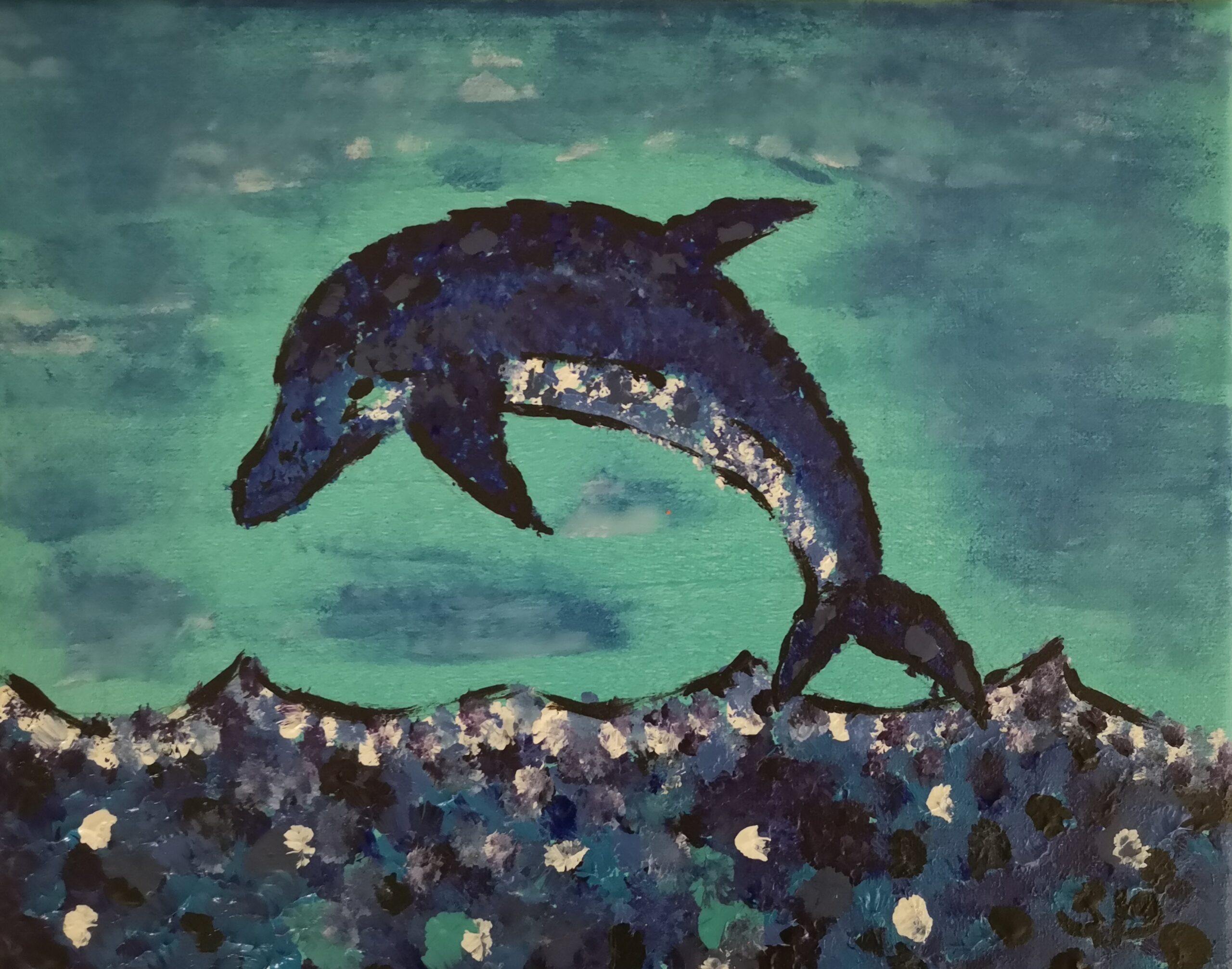 Bild eines springenden Delfins über dem Meer