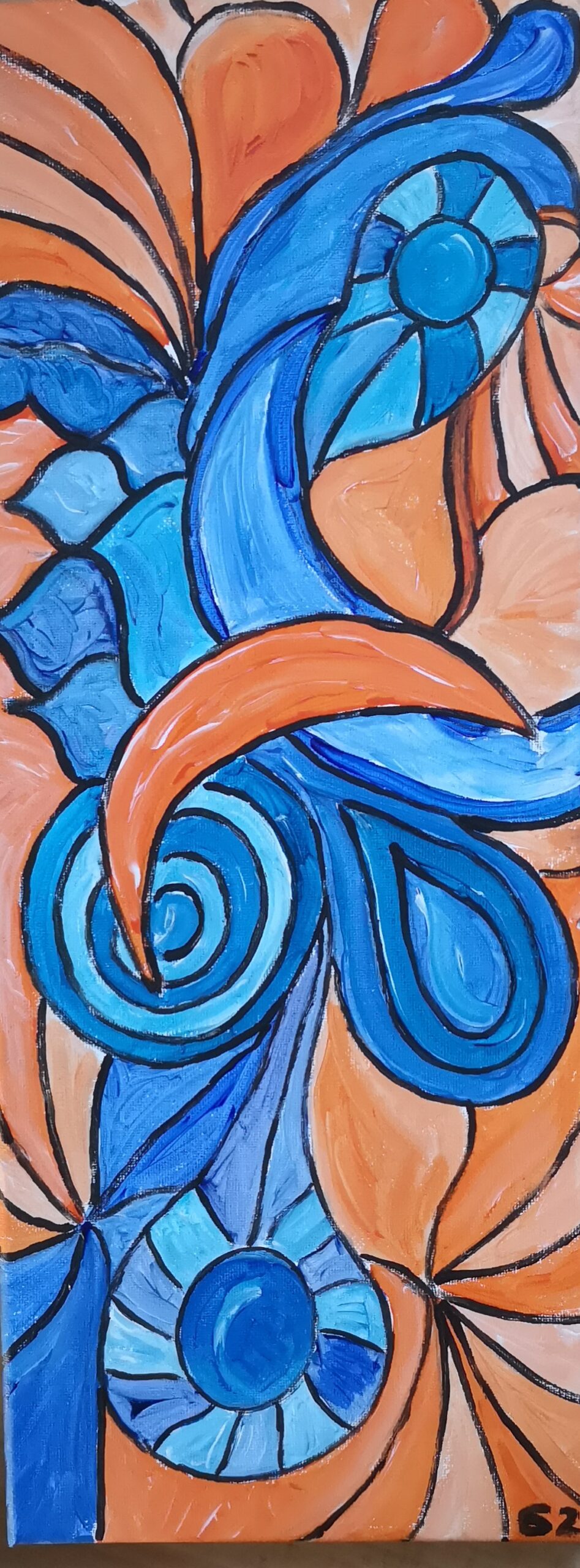 Bild eines ineinanderverflochtenen Musters aus orange und blau